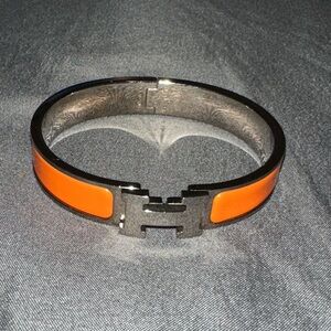Hermès Clic H Bracelet, in orange enamel
